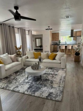 Spacious beautifully furnished 5 bedrooms 3 full bath House with Ping Pong and Pool table and 85 in tv in game room